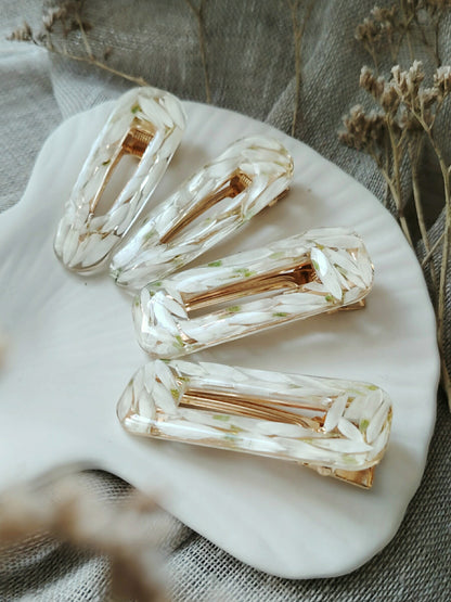 Valkoinen paperikukkapinni, eri muotoja